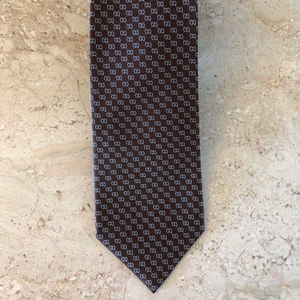 Brown Gucci monogram silk tie.